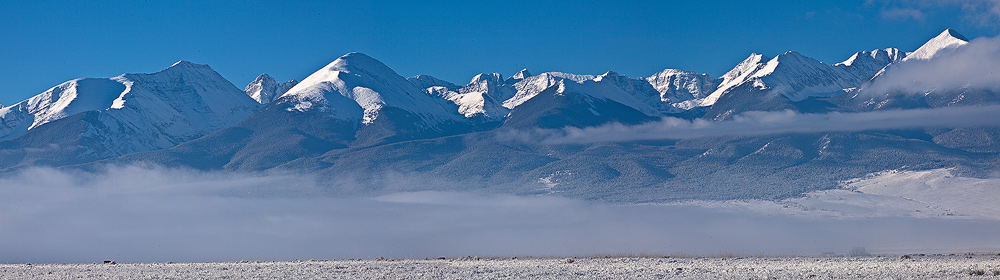 A panorama of the range as it emerged from morning fog.