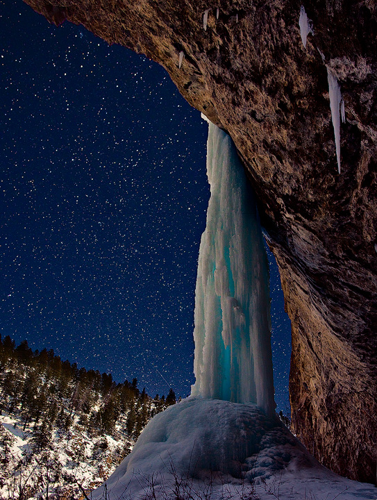 Frozen Waterfall (popular with ice climbers as 'stone free') in RIfle Mountain Park, in moonlight.