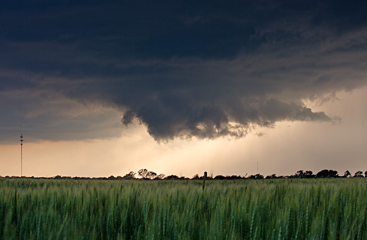 Wall Cloud A rotating wall cloud forms at the base of a supercell thunderstorm.