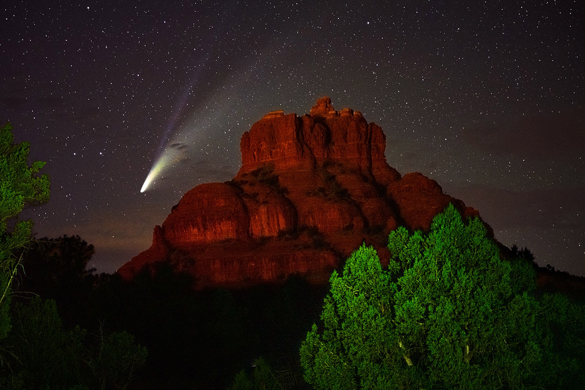 Comet NEOWISE setting behind Bell Rock in Sedona. I light-painted the trees with a headlamp.