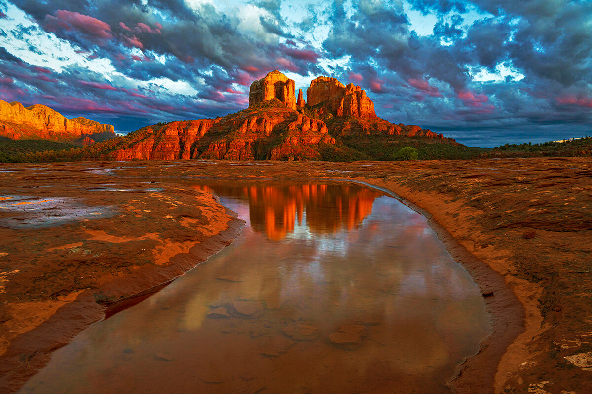 A stormy day led to lots of puddles at Secret Slickrock, and an interesting sunset.