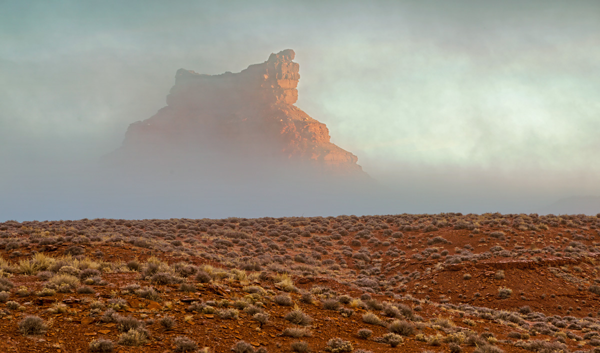 Monument appears out of the fog at Valley of the Gods.