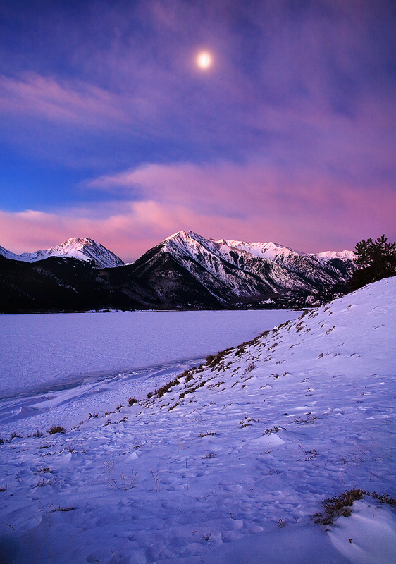 Moonset over frozen Twin Lakes, January