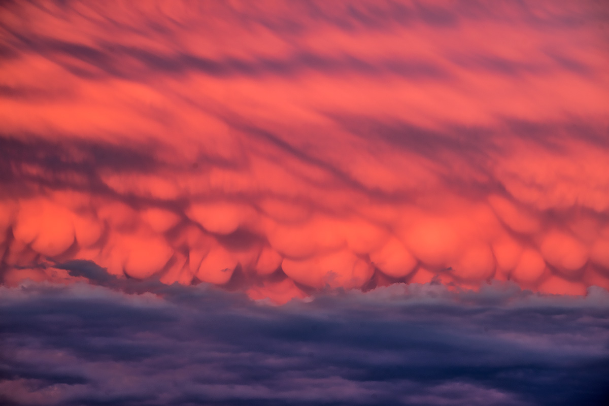 Colorful display of mammatus clouds at sunset, north of McCook, Nebraska.